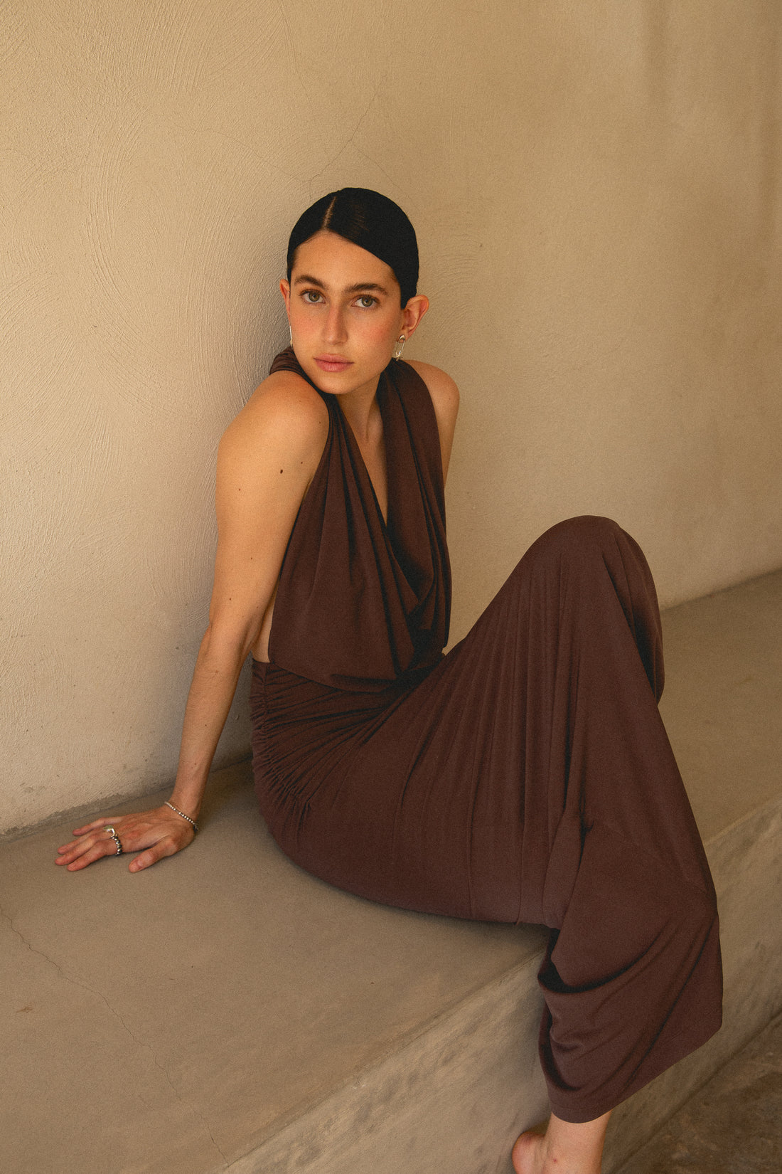 Model wearing Gina Dress in halter style – versatile stretch jersey dress