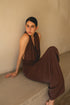 Model wearing Gina Dress in halter style – versatile stretch jersey dress